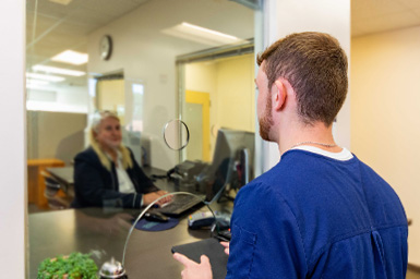 Student at bursars office