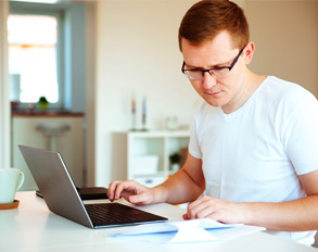 Student working on a laptop.