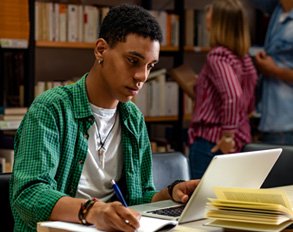 Student studying in library