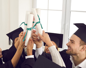 Group of graduates with their diplomas