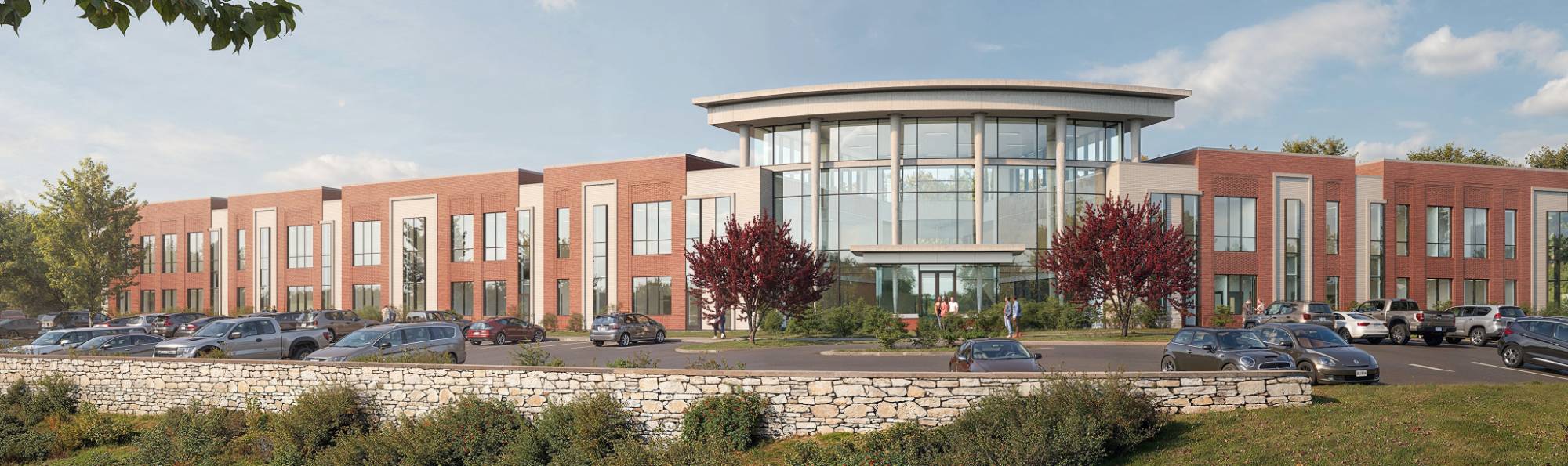 Students gather in front of Dickson campus with mascot Finn.