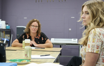 Students in Pam Esposito's Graphic Design III class host Amqui Station Farmers Market Manager Denise Pullella for a discovery meeting. 