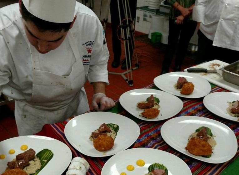 Marcio Florez plates his winning dish during the San Pellegrino® Almost Famous Chef® South Regional Competition