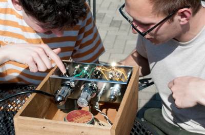 Evan West and Hugh Foley recently completed a tube guitar amplifier to better understand electronics and the physics of sound amplification.  