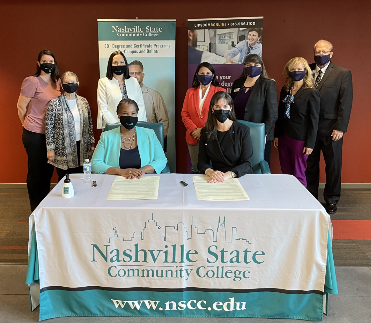 Nashville State Community College President Dr. Shanna L. Jackson and Lipscomb University President Dr. Candice McQueen signing an articulation agreement providing a pathway to a bachelor's degree at Lipscomb Online for graduating Nashville State students who want to continue their education.