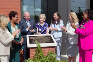 Nashville State Community College held a ceremony with federal, state, local, and community leaders when it unveiled a commemorative plaque naming the campus building in memory of Doug and Robbie Odom. 